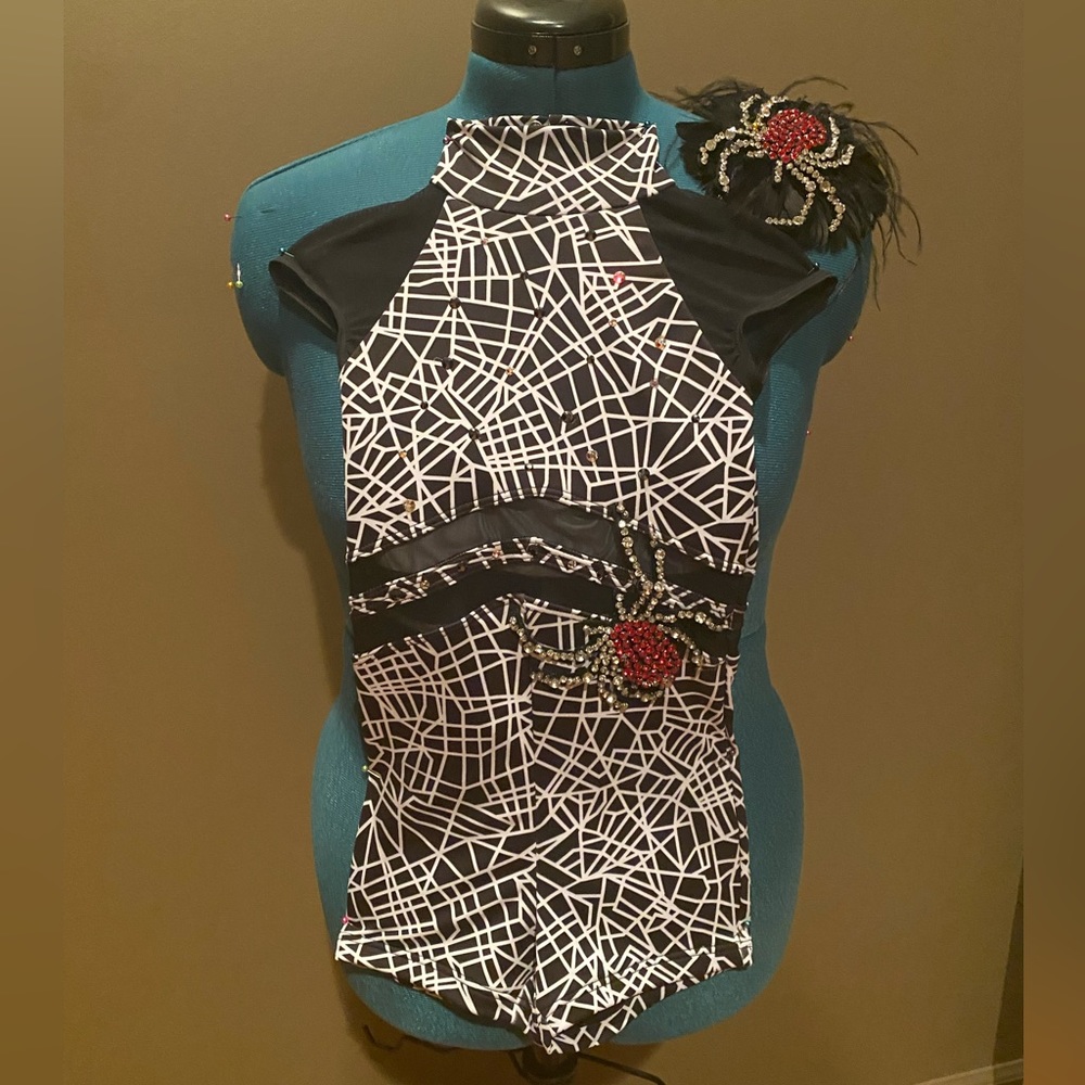 Black and white shorts leotard, spider rhinestone apliques. Weissman SC.